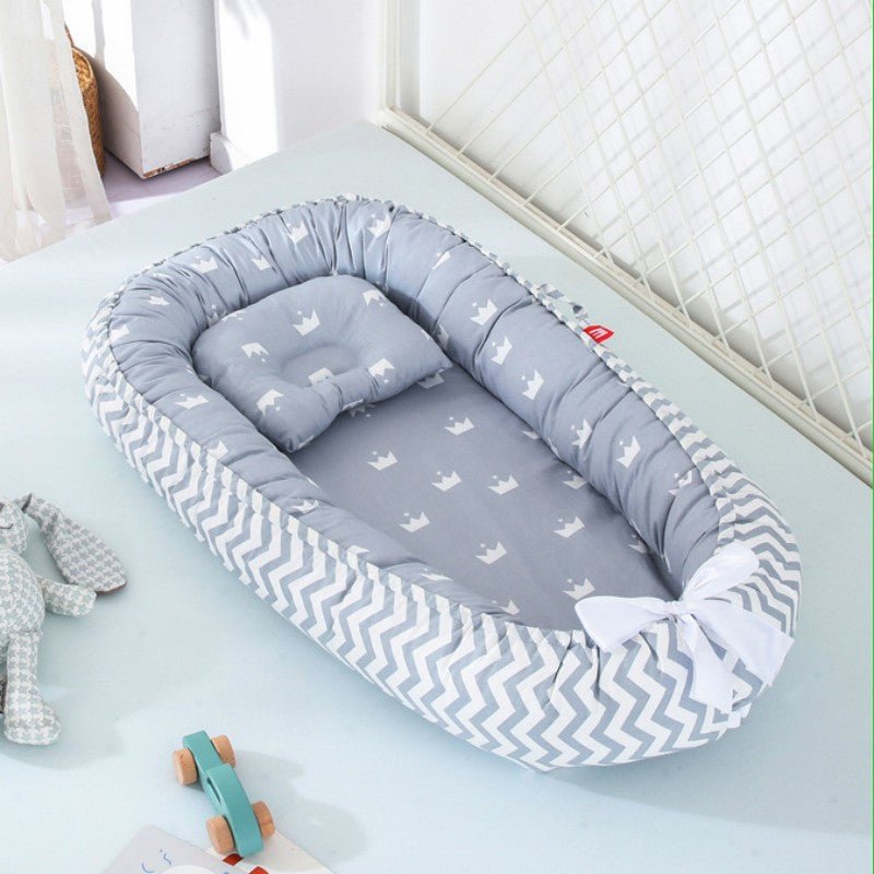 Réducteur de lit bebe | Dodo Cocoon - Petitsbeautes
