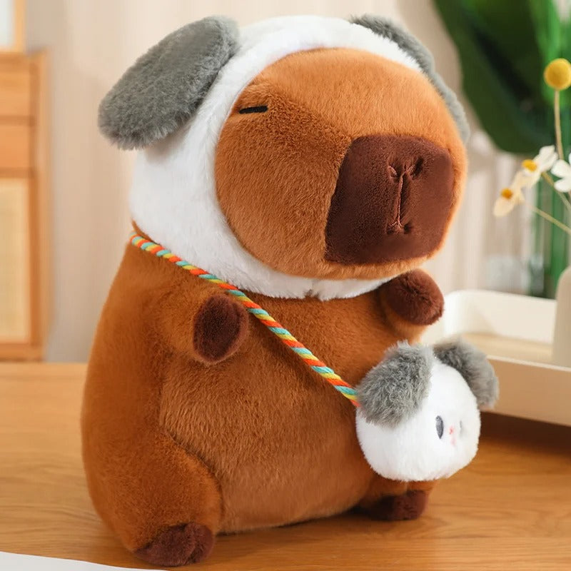 Peluche capybara adorable avec capuche et petit sac en bandouliĂšre