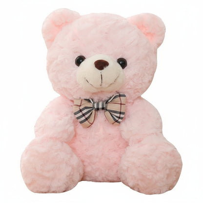 Adorable Ours en peluche rose de 25cm avec nœud papillon à carreaux.
