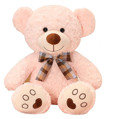Adorable Ours en peluche rose de 35cm avec nœud papillon à carreaux.